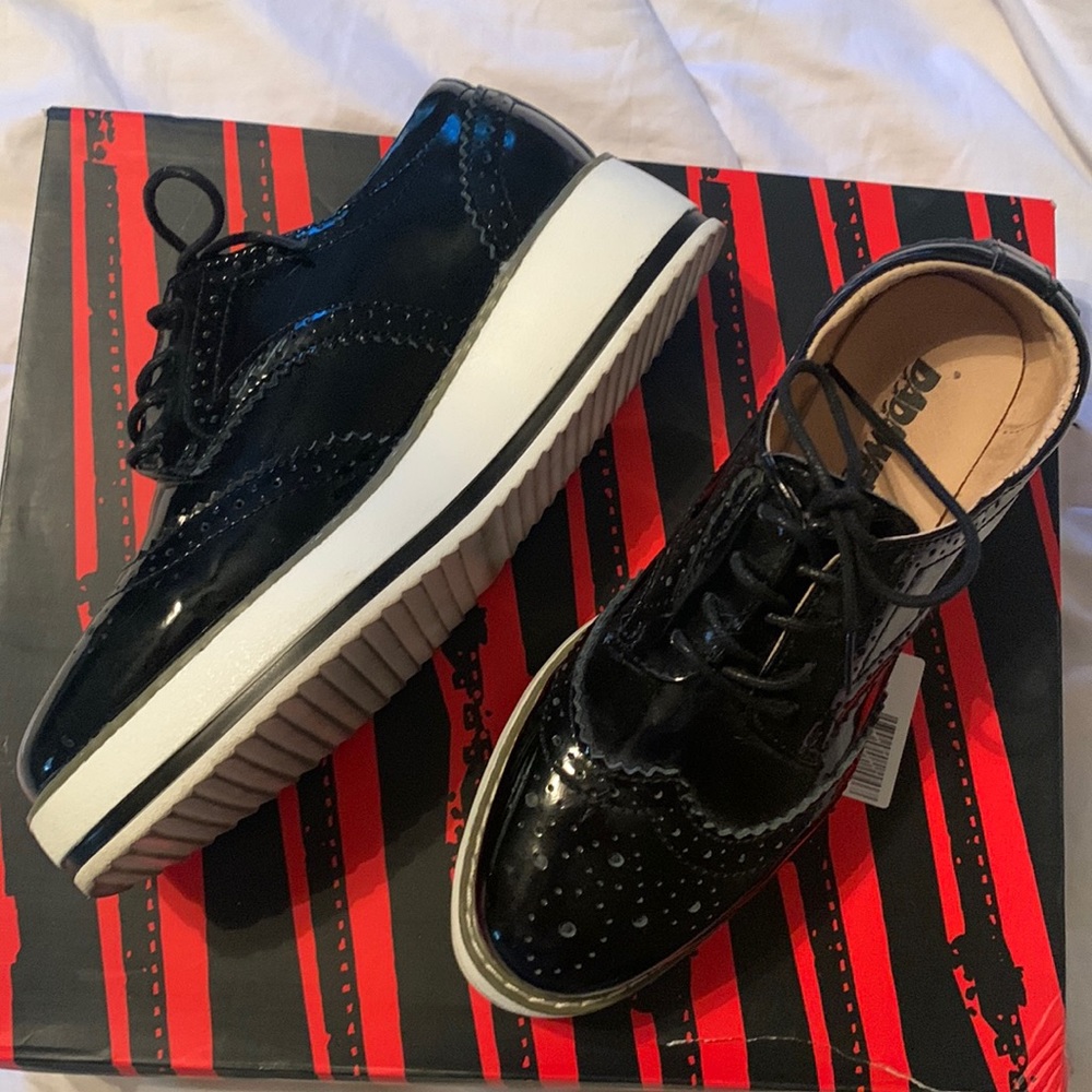 Black and white platform shoes